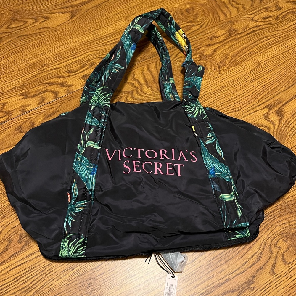 Victoria’s Secret bag. Zips up to a smaller size.